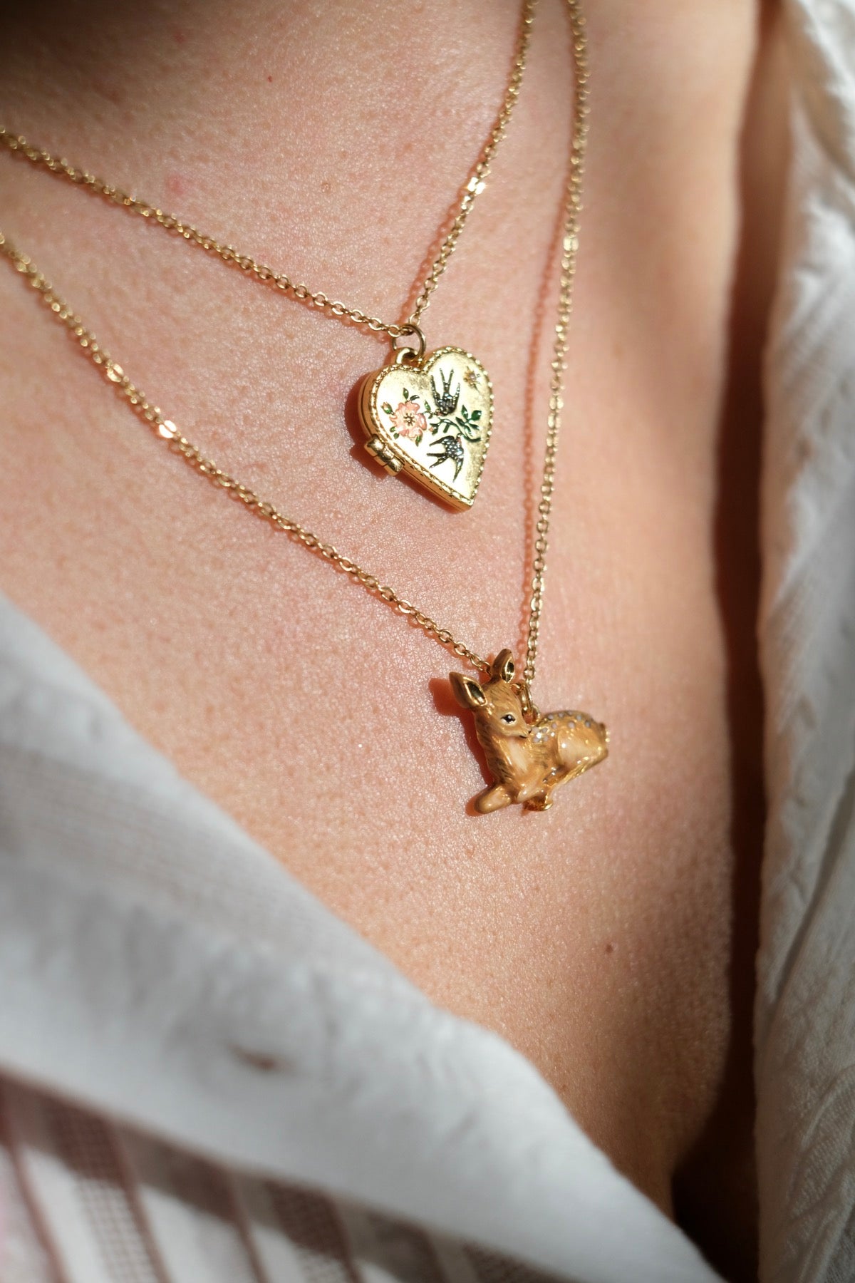 Collana cuore scrigno rondini e Collana Bambi
