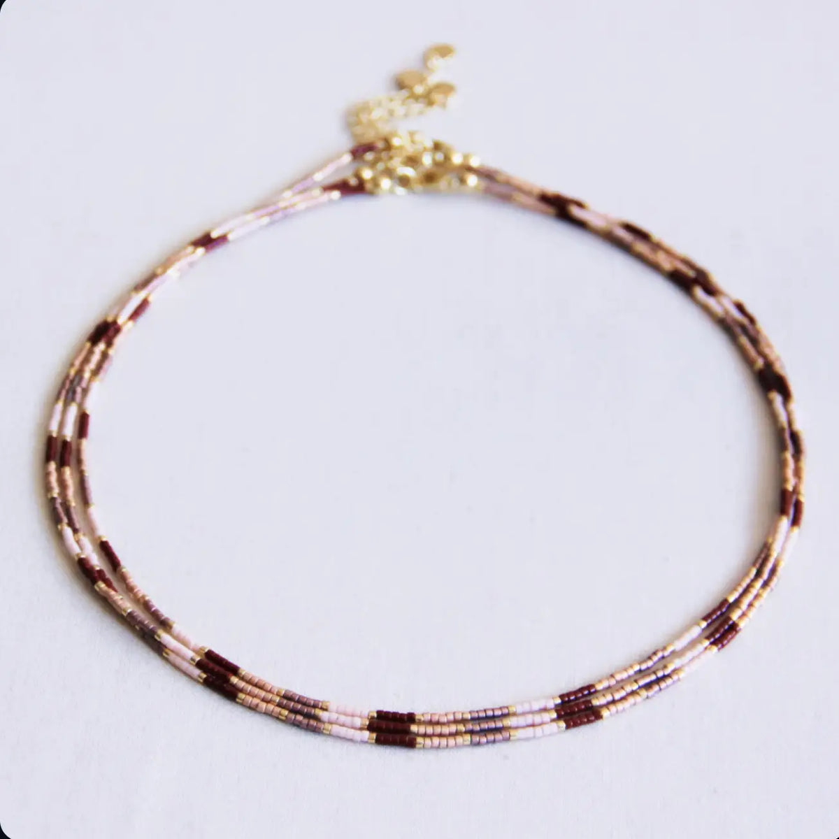 Collana Bagliore rosa nude bordeaux