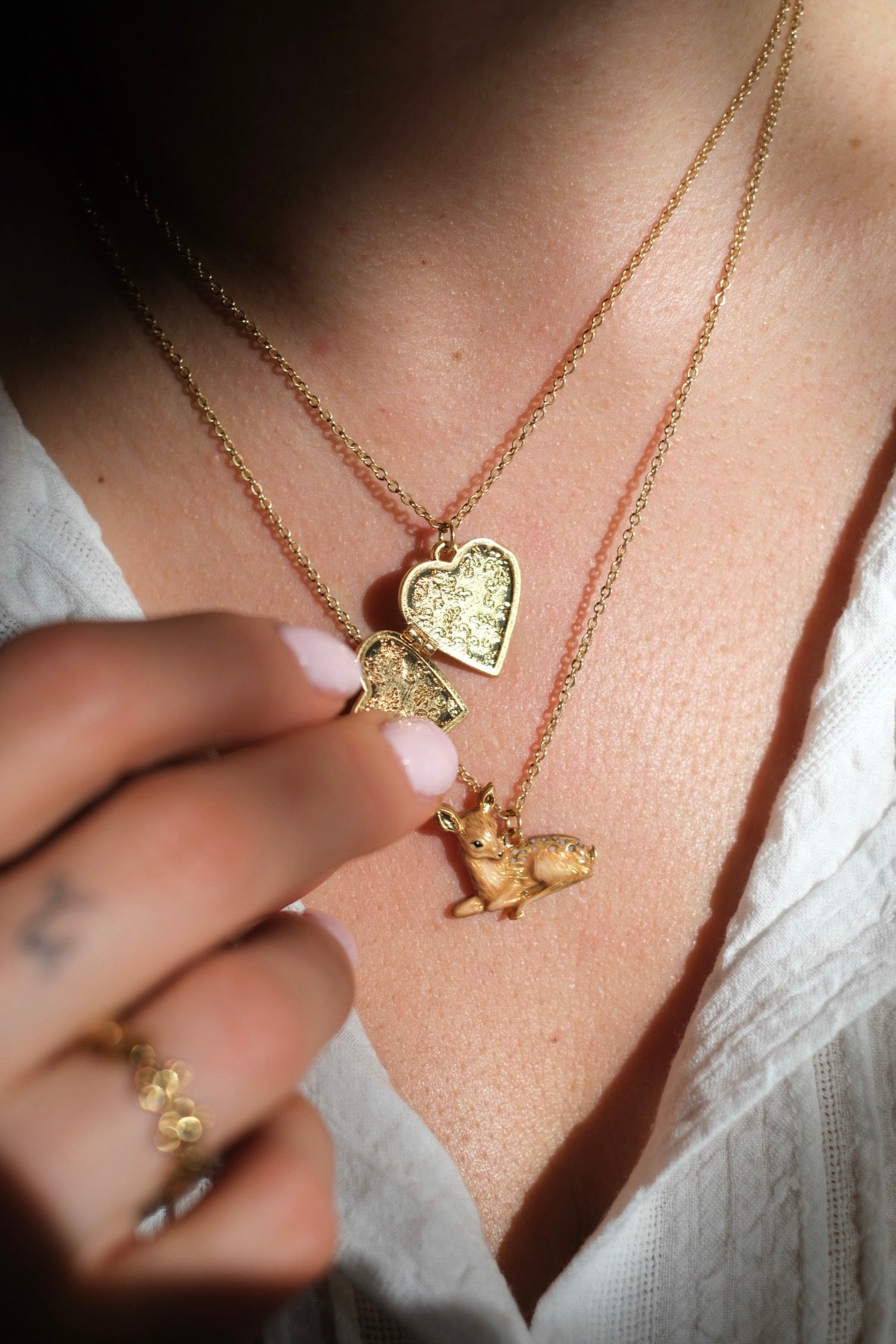 Collana cuore scrigno rondini e Collana Bambi